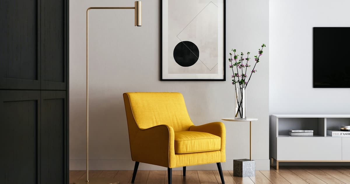Professional furniture removal team moving a sofa in Newcastle